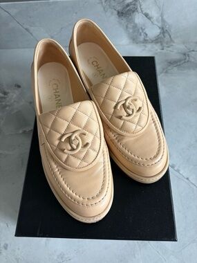 CHANEL Quilted Leather Loafers in Light Beige